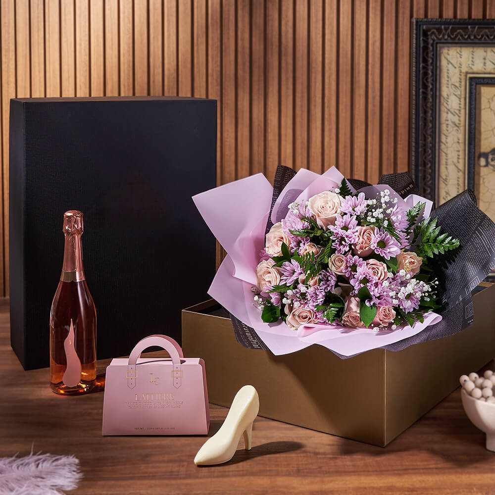 Pink and lavender bouquet with a gift box, rosé and chocolates